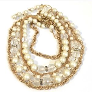 Elegant pearl/gold choker. Perfect statement piece for office or an evening out